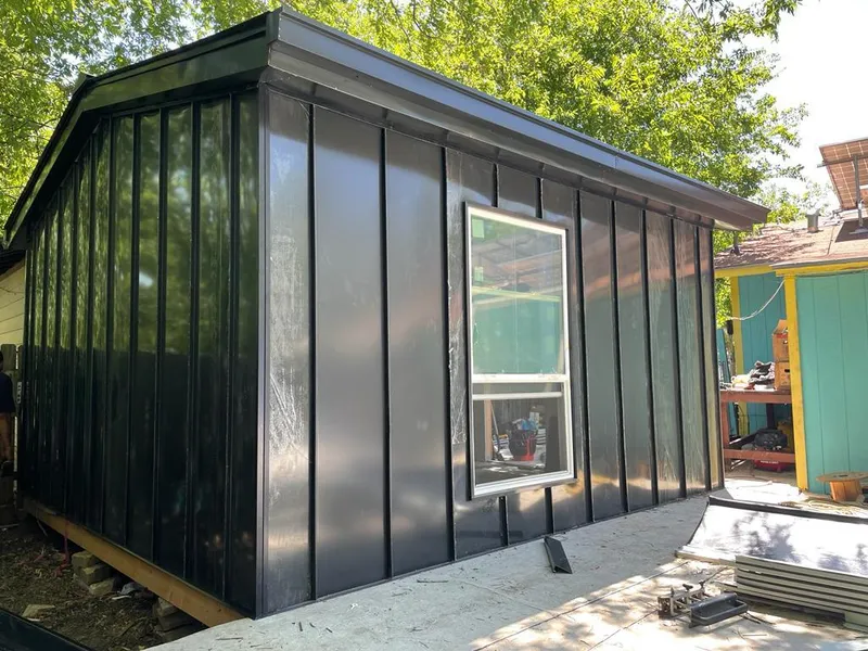 Black standing seam metal wall panels for Roof Inspection in Miami Shores